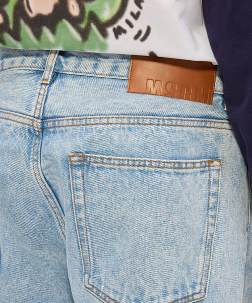 MSGM PANTALONI BLU CHIARO IN DENIM MARMORIZZATO