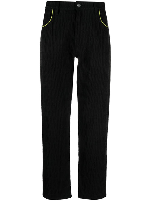 MOSCHINO COUTURE PANTALONE CON LOGO ALL OVER NERO