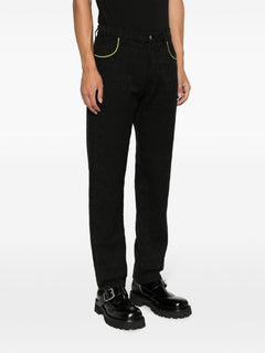 MOSCHINO COUTURE PANTALONE CON LOGO ALL OVER NERO